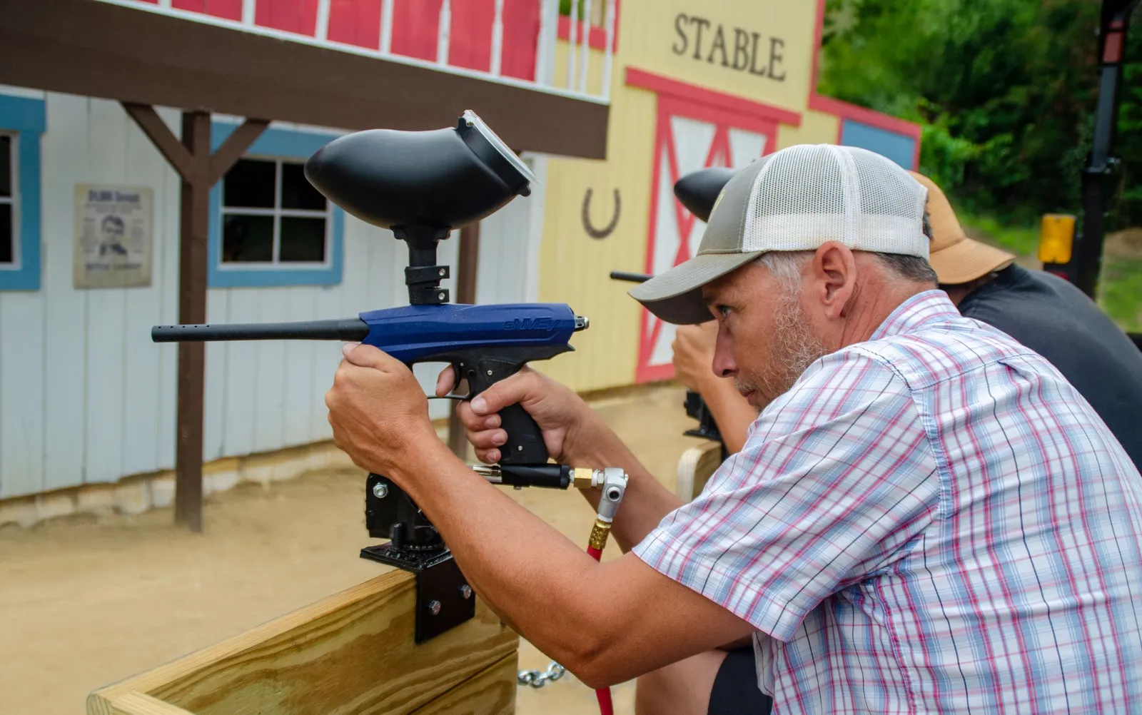 man with paintball gun