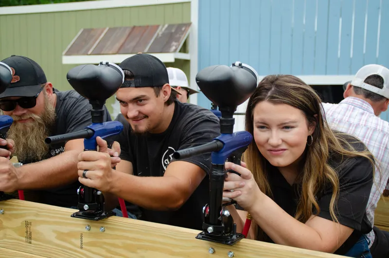 friends practicing shooting