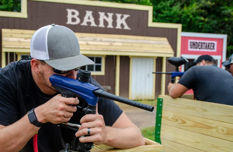 players using blasters at Trigger Town Old West Paintball