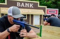 players using blasters at Trigger Town Old West Paintball