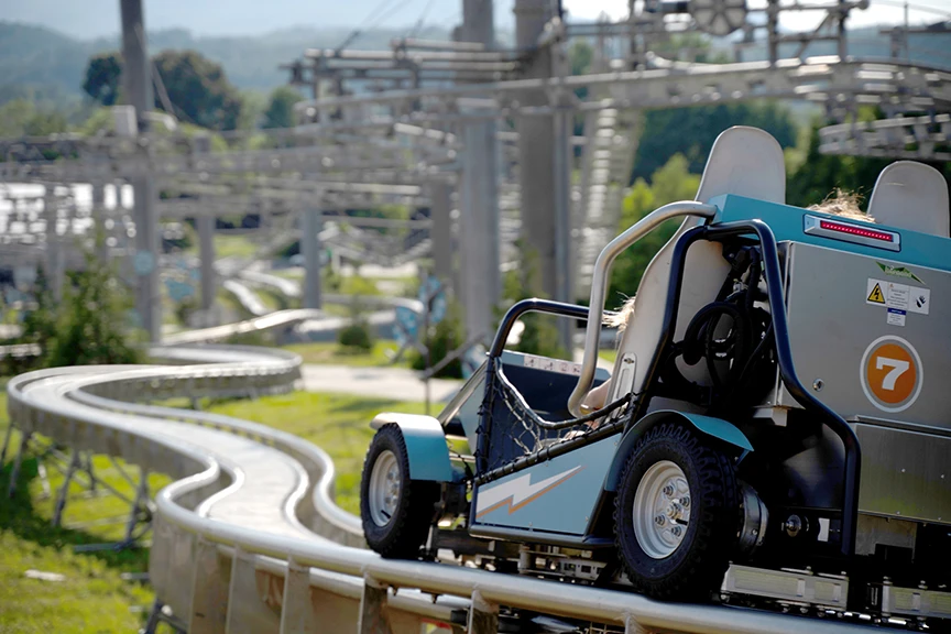 Rowdy Bear Avalanche Snow Coaster with Ski Lift Shootout in background