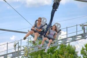 family riding Laser Gun Coaster at Rowdy Bear's Smoky Mountain Snowpark