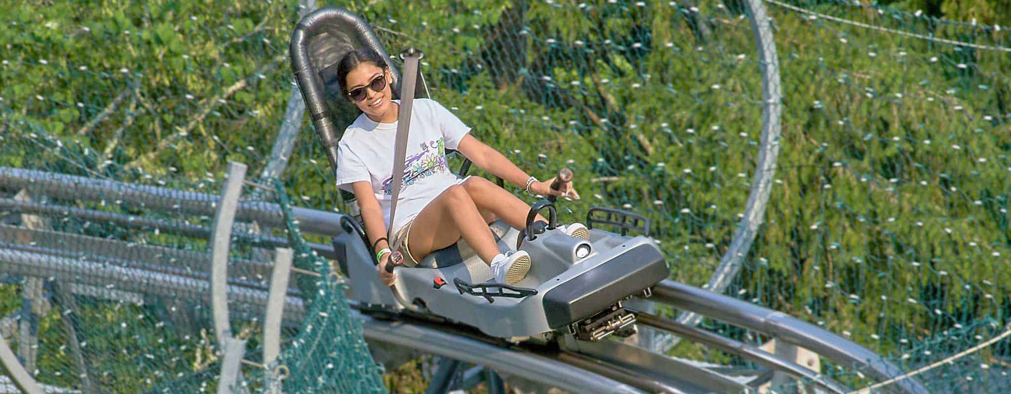 Couple riding Alpine Coaster