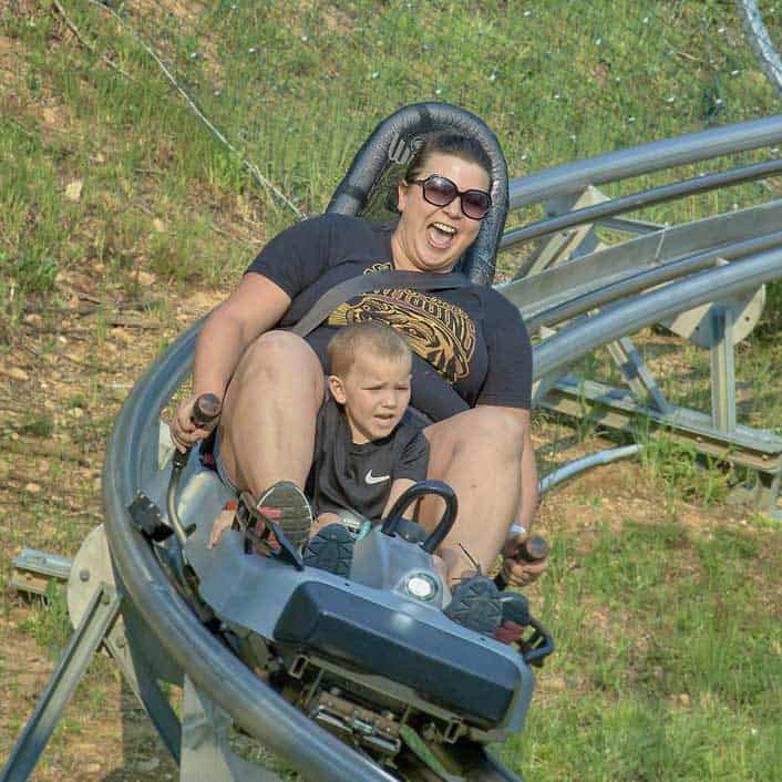 Dad and son on Alpine Coaster