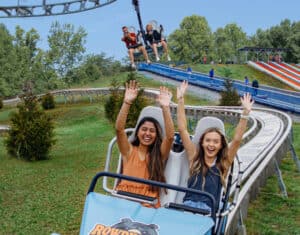 ski lift shootout coaster and avalanche mountain coaster at rowdy bear smoky mountain snowpark