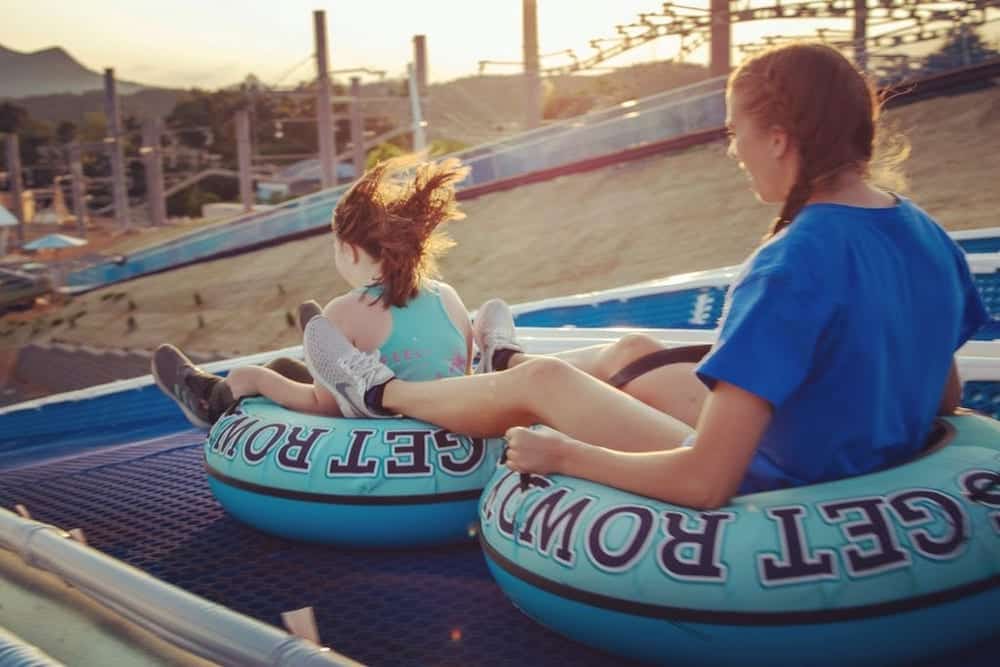 girls going hill tubing in pigeon forge at rowdy bear ridge