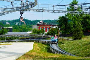 ski lift shootout coaster and avalanche snow coaster at rowdy bear smoky mountain snowpark in pigeon forge