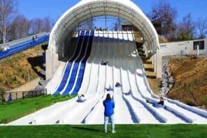 snow tubing in pigeon forge at rowdy bear smoky mountain snowpark